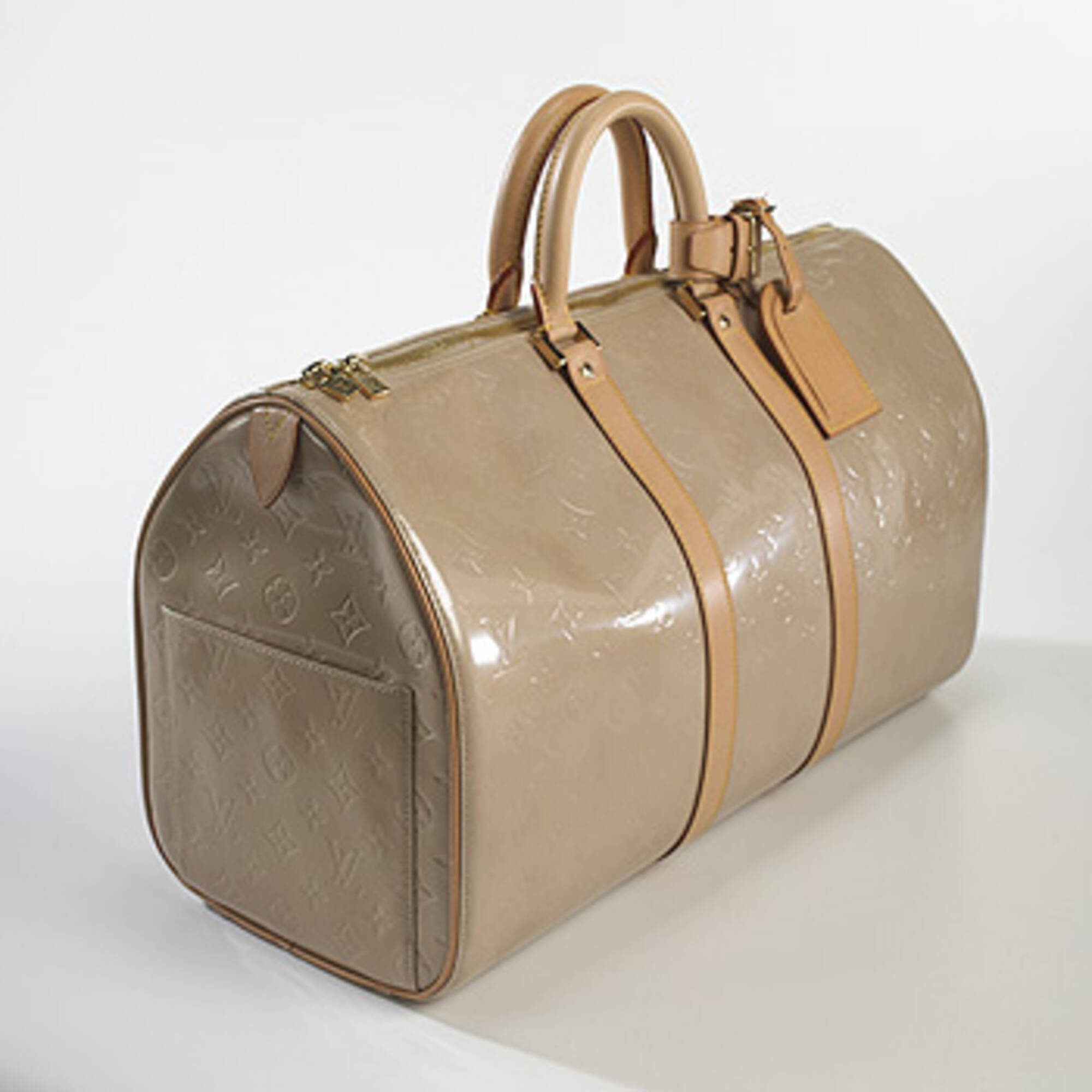 Sold at Auction: LOUIS VUITTON WEEKENDER BAG