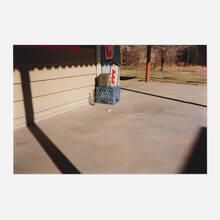 102: WILLIAM EGGLESTON, Untitled (Bottle on Cement Porch) (from 
